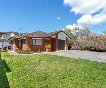 This tidy brick and tile home in Otahuhu ticks all the boxes for family living