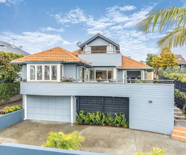 This smart Stanley Point home enjoys breathtaking sea and city views