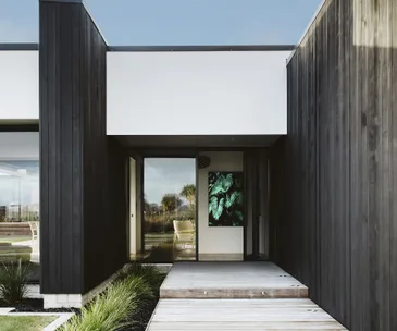This sleek Cambridge home makes a case for black ceilings