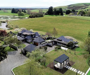 This impressive home comes with its own private lake and putting green