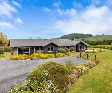 Enjoy relaxed, tranquil living at this Whakaipo Bay property for sale