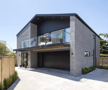 This striking Bucklands Beach home for sale is designed to impress
