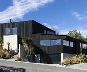 Enjoy stunning lake views from this striking Queenstown home