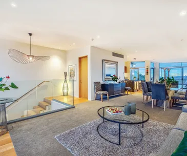 Enjoy panoramic views from this stylish penthouse in Rothesay Bay