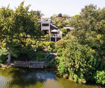 You’ll feel like you’re on holiday at this waterfront Hokowhitu home