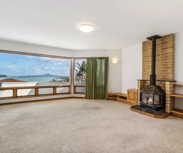 This perfectly positioned Half Moon Bay home is filled with potential