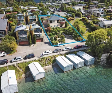 Enjoy an enviable lakefront position in this 5-bedroom Queenstown home