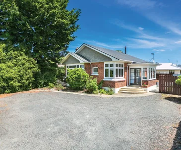 This solid four-bedroom home for sale in Mosgiel promises easy-care living
