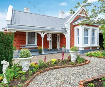This 3-bedroom Dunedin home for sale is filled with character