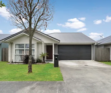 This tidy Takanini home for sale has space for the whole family