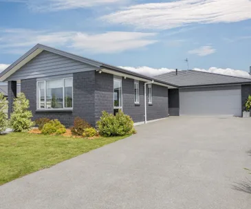 This immaculate Paraparaumu home for sale offers easy family living