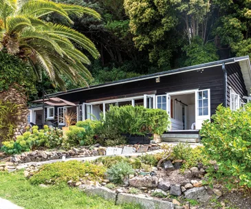 This waterfront hideaway in Glendowie is its own little slice of paradise