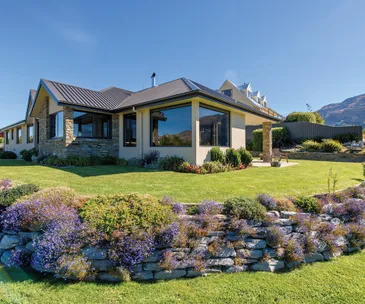 Soak up spectacular lake and mountain views from this tidy family home