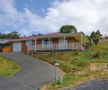 This solid brick and tile house is the modern home you’ve been looking for