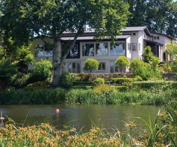 This European Chalet style home has the most idyllic waterfront views