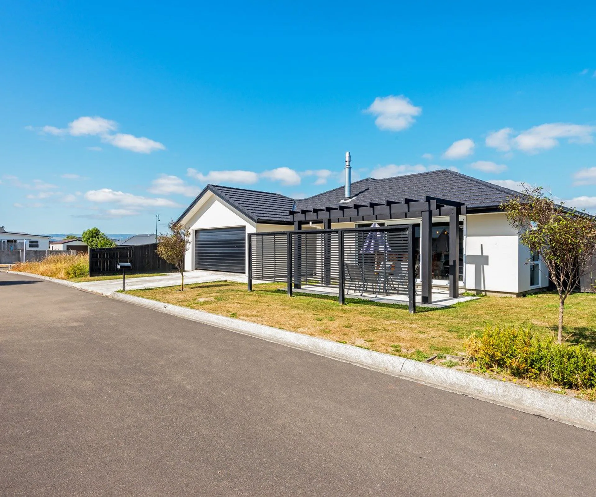 Enjoy modern and easy living in this low-maintenance 4-bedroom home