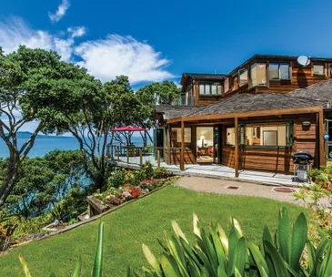 Live the dream on the Campbells Bay cliff in this 4-bedroom home