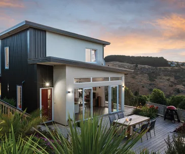 Enjoy views of the Southern Alps from this beautifully designed home