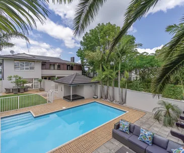 Enjoy panoramic city views from this waterfront home in Bayswater