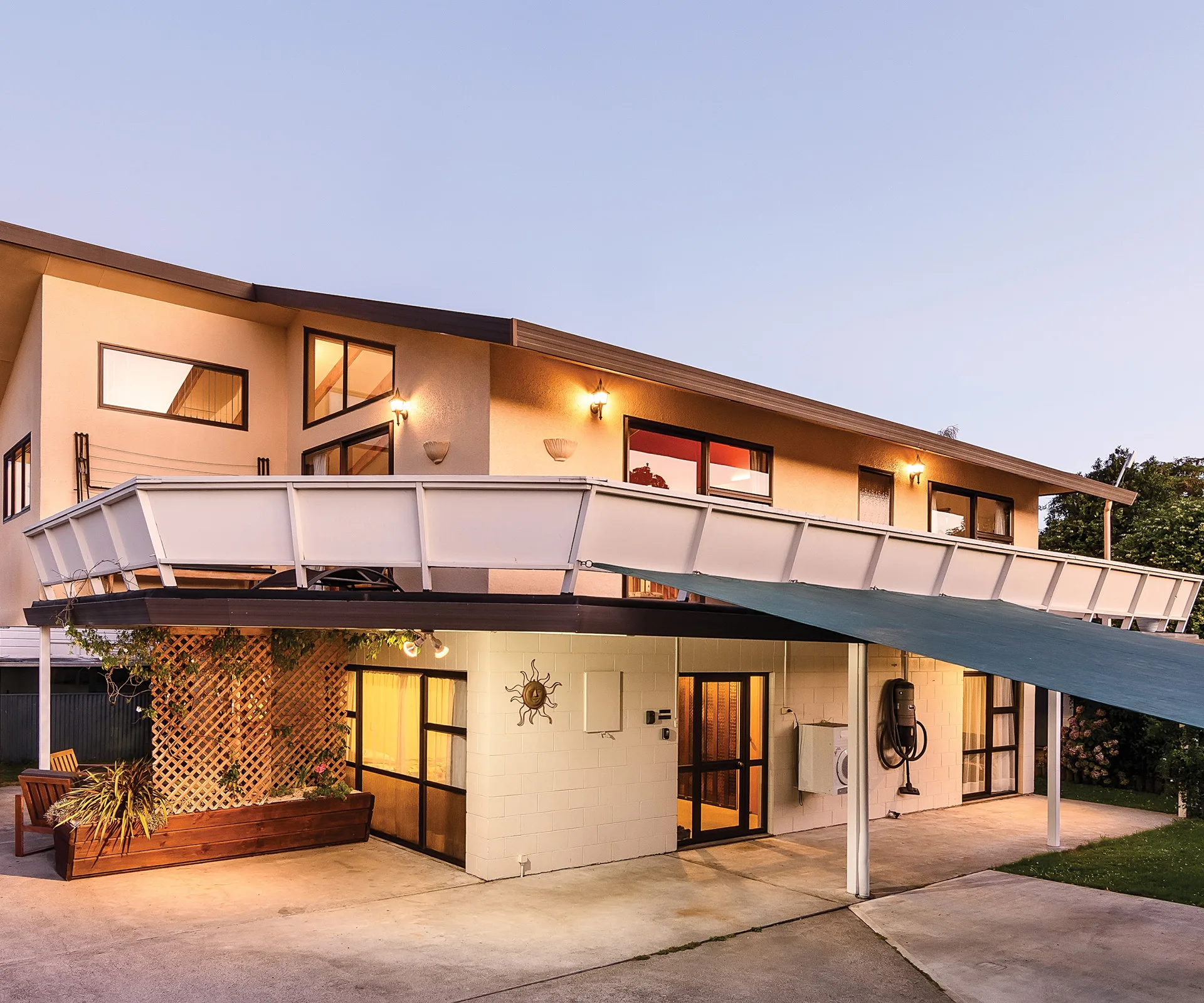 Enjoy enviable all day sun and a wrap-around deck at this Motueka home