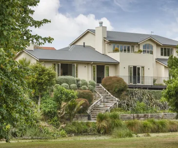 This 5-bedroom home epitomises luxury living by the Hokowhitu Lagoon
