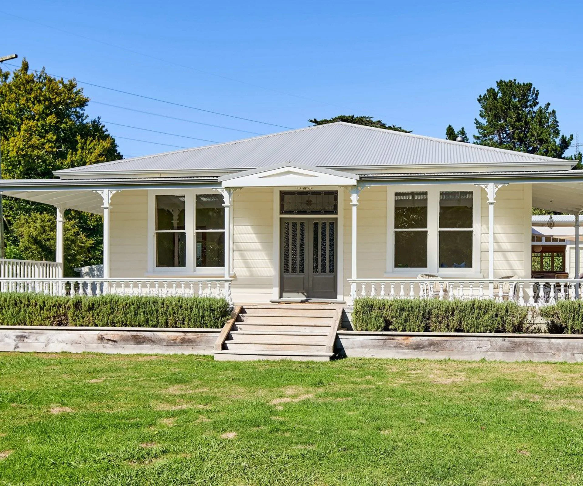 This historic cottage for sale in Judgeford is full of old-world charm