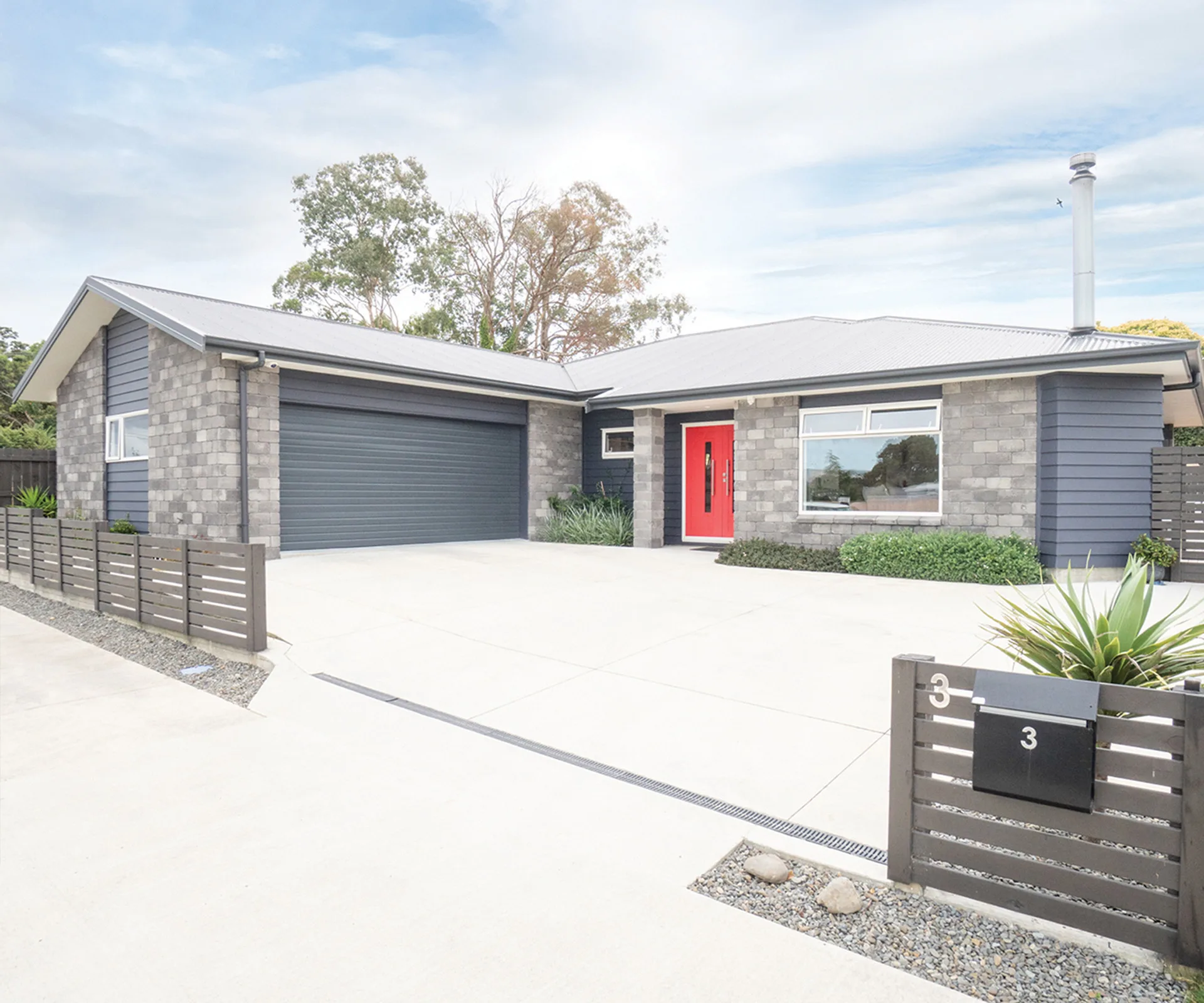 This low-maintenance home for sale will make you forget the lawnmower