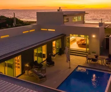 This modern four-bedroom home is a seaside sensation