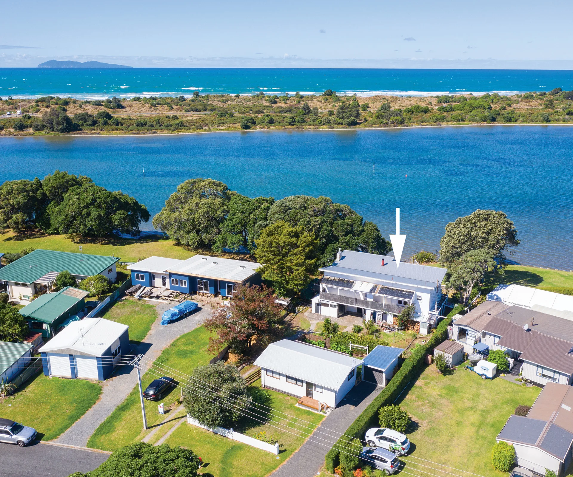 This home on the stunning Athenree harbourfront is the ultimate do-up