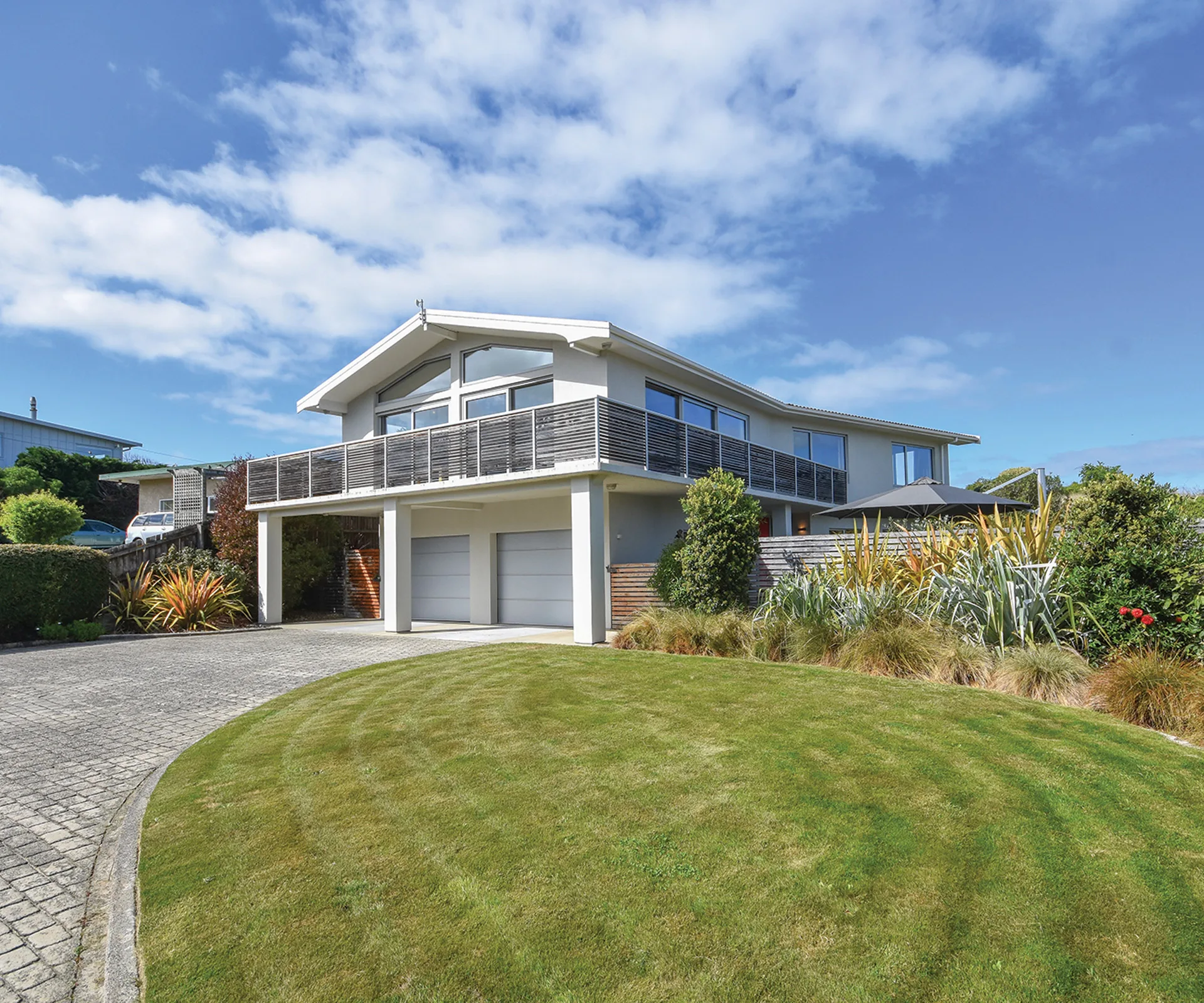 This four-bedroom Dunedin home offers the ultimate beachfront lifestyle