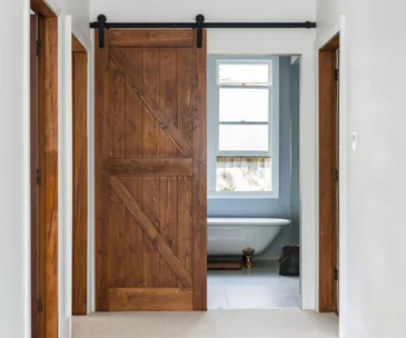 12 homes that prove barn doors aren’t just for the countryside