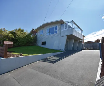 This classic 1970s home comes with enviable city views