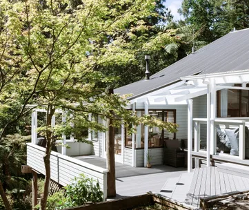 See how a dark log cabin home received a modern new look