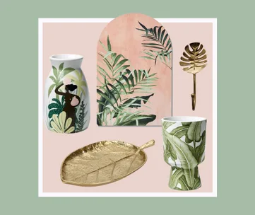 Decorative items with tropical leaf designs, including vases, a wall art piece, a hook, and a leaf-shaped tray.