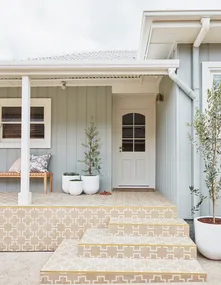 The dynamic stylists at Three Birds work their magic transforming the exterior of this home