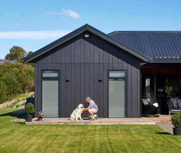 See inside this stunning black-clad home with seamless indoor-outdoor flow