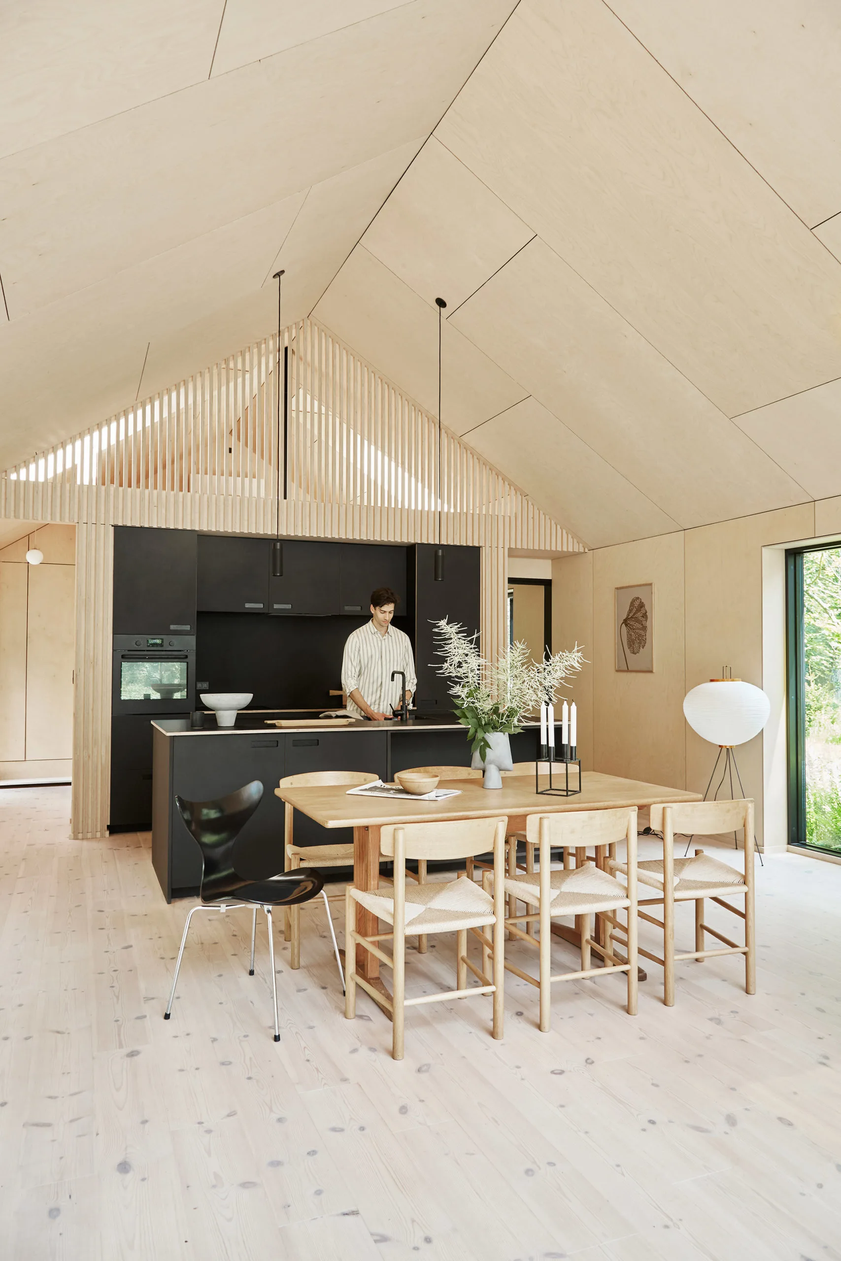 This cottage in the woods has a seamless transition between house and nature