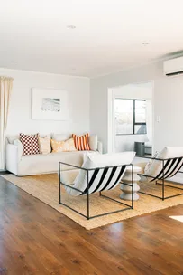 This former bach is now a colourful, coastal home