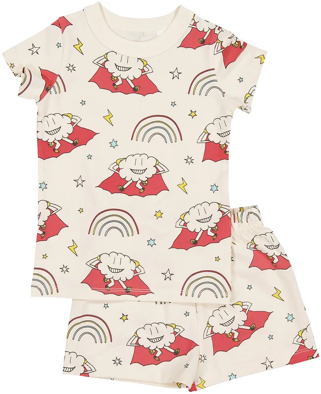 Children's pajama set with superhero cloud patterns, featuring rainbows, stars, and lightning bolts on a cream background.