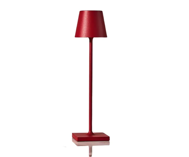 A tall, modern red lamp with a sleek design and square base on a white background.