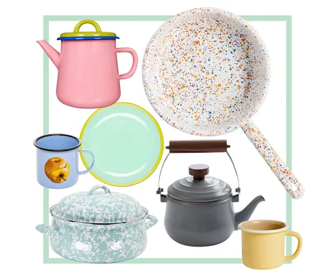 Assorted colorful kitchenware including teapots, mugs, a pan, and a plate arranged on a white background.