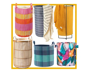 Colorful laundry hampers with various patterns and designs, including striped, plaid, and floral.