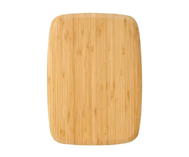 A rectangular bamboo cutting board with rounded edges.