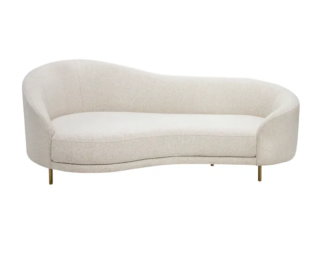 Curved beige sofa with smooth fabric and minimalist design, supported by sleek golden legs.