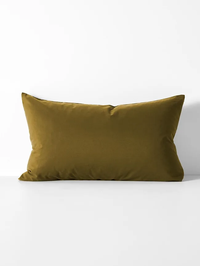 Olive green rectangular pillow against a white background.