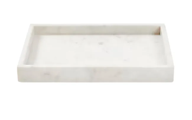 A rectangular white marble tray with smooth edges and a flat surface.