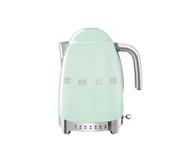 Mint green SMEG electric kettle with a chrome handle and temperature indicator.