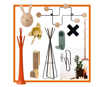Various artistic coat hooks and hangers, including designs shaped like a rabbit, a flower, and geometric shapes.