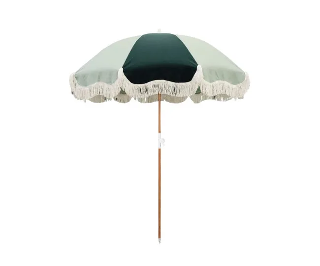 A green and beige beach umbrella with fringe trim and a wooden pole, viewed from the front against a white background.