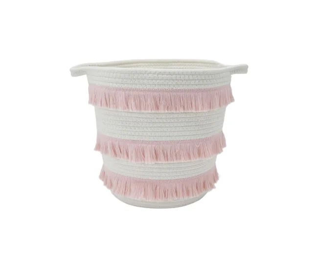 A white woven basket with pink fringe detailing and two small handles.